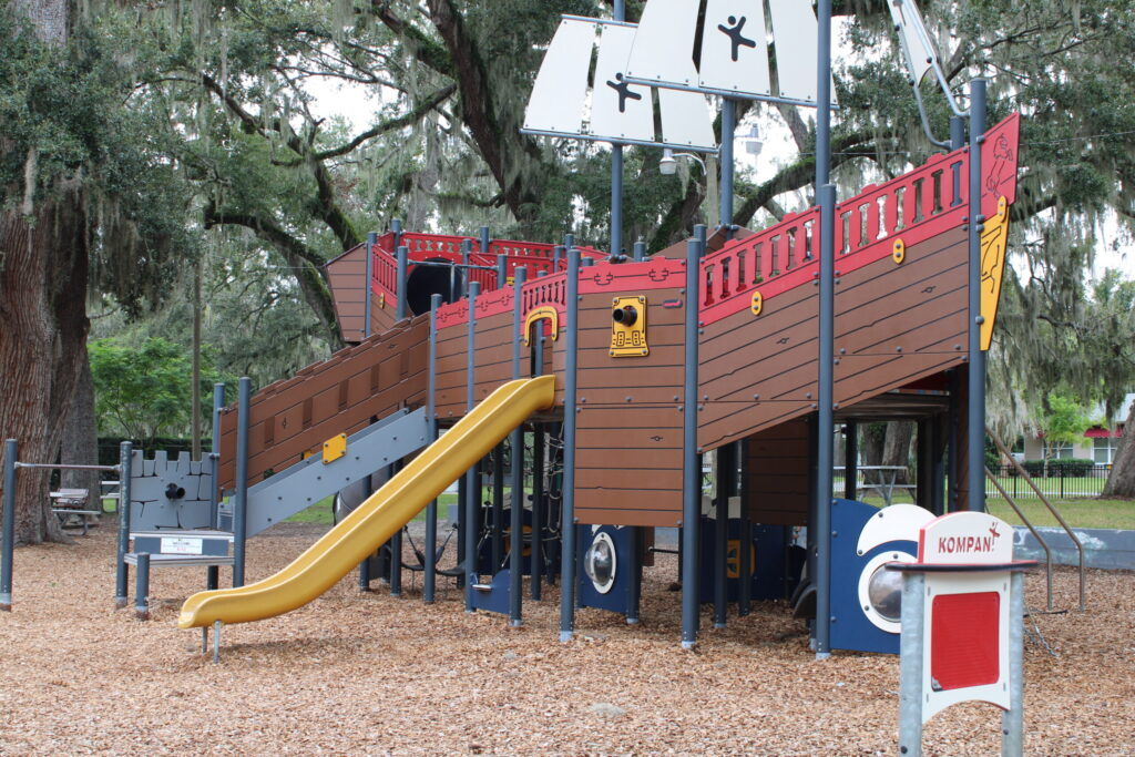 The brightly colored playground structure and climbing frame for younger children at Gilbert Park in Mount Dora.